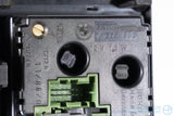Picture of a black climate control panel and clock for a BMW E30 3-Series. Part Number for the clock