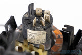 Picture of a black climate control panel and clock for a BMW E30 3-Series. Part Number for the rotary switch