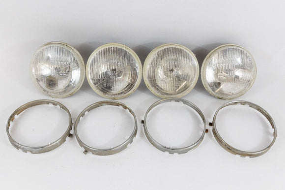 USED Hella H4 Headlamp Set w/ Daytime Running Lights & Rings for BMW