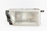 Used 1985-1992 Alfa Romeo Milano Left Head Light w/ Mounting Bracket